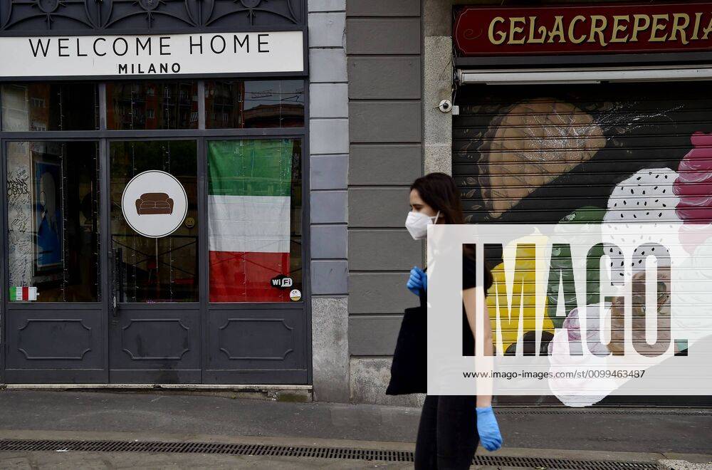 Milan, People on the Naviglio Grande, Darsena and Piazza 24 Maggio while they are preparing phase 2 of the coronavirus quarantine, in the photo Italian flag in a shop window (Duilio Piaggesi Fotogramma, Milan - 2020-04-18) p.s. la foto e utilizzabile nel rispetto del contesto in cui e stata scattata, e senza intento diffamatorio del decoro delle persone rappresentate