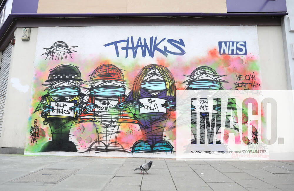 Day Twenty Six of Lockdown in London. A pigeon walks past a grafitti mural giving thanks to the NHS in a very quiet central London for a Saturday as the country is on lockdown due to the COVID-19 Coronavirus pandemic. People are not allowed to leave home except for minimal food shopping, medical treatment, exercise - once a day, and essential work. COVID-19 Coronavirus lockdown, London, UK, on April 18, 2020