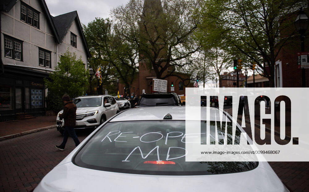 A car is seen as people participate in a car protest to reopen Maryland and end the stay at home order imposed during the Coronavirus COVID-19 pandemic, near the state capitol building in Annapolis, Maryland on Saturday, April 18, 2020. WAP20200418306 KEVINxDIETSCH