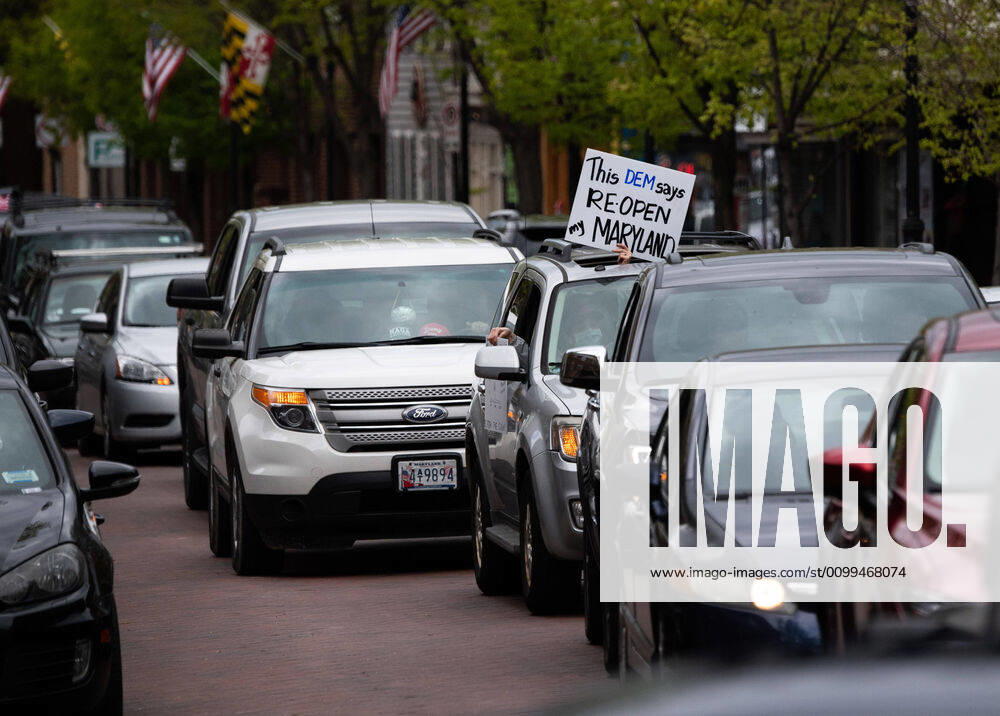 Drivers line their vehicles up during a car protest to reopen Maryland and end the stay at home order imposed during the Coronavirus COVID-19 pandemic, near the state capitol building in Annapolis, Maryland on Saturday, April 18, 2020. Drivers circled Annapolis hoking their horns and calling for Gov. Larry Hogan (R-MD) to end the stay at home order. WAP20200418313 KEVINxDIETSCH