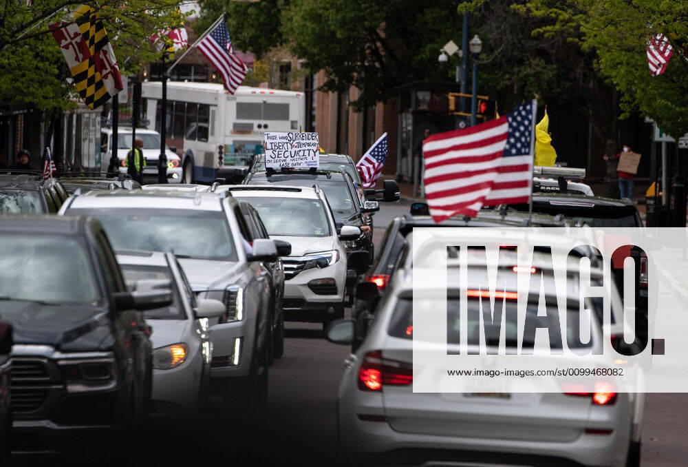 Vehicles line up during a protest to reopen Maryland and end the stay at home order imposed during the Coronavirus COVID-19 pandemic, near the state capitol building in Annapolis, Maryland on Saturday, April 18, 2020. Drivers circled Annapolis hoking their horns and calling for Gov. Larry Hogan (R-MD) to end the stay at home order. WAP20200418321 KEVINxDIETSCH