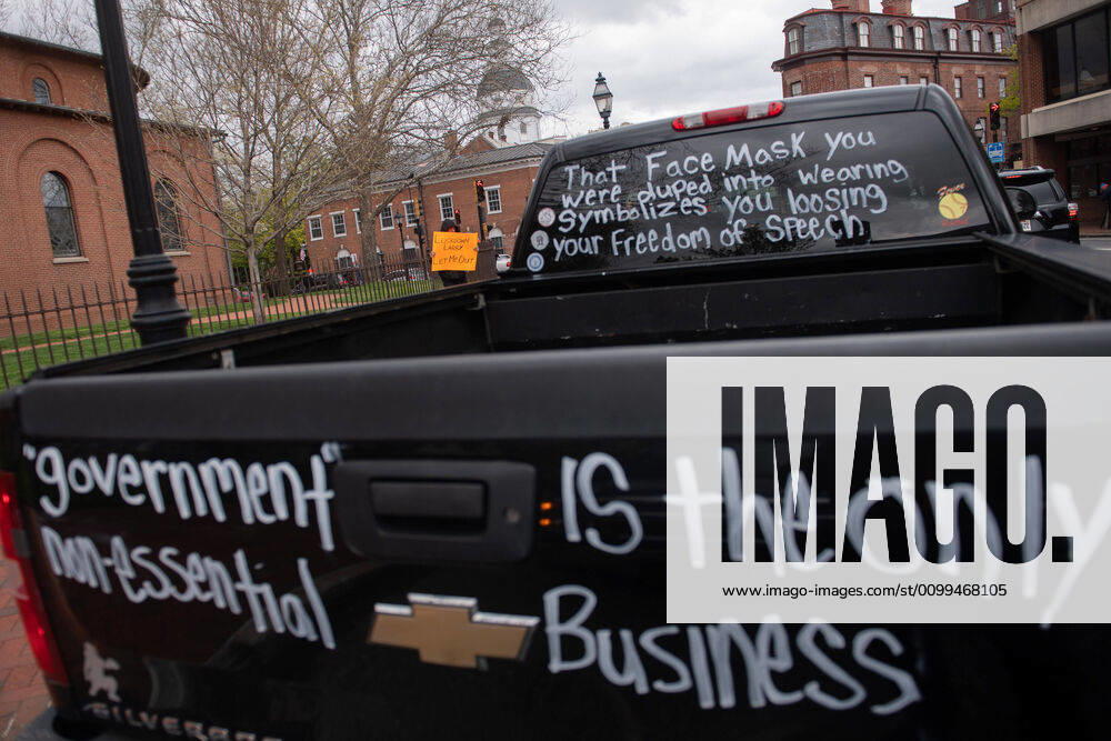 Drivers in vehicle participate in a car protest to reopen Maryland and end the stay at home order imposed during the Coronavirus COVID-19 pandemic, near the state capitol building in Annapolis, Maryland on Saturday, April 18, 2020. Drivers circled Annapolis hoking their horns and calling for Gov. Larry Hogan (R-MD) to end the stay at home order. WAP20200418335 KEVINxDIETSCH