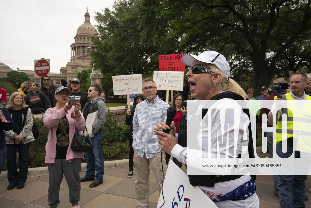 Claudia Cuchia of Austin speaks to the crowd as a few hundred Texans flaunt social distancing guidelines in an InfoWars inspired rally at the Texas Capitol where founder Alex Jones encourages the crowd with right-wing rhetoric. Gov. Greg Abbott announced Friday relaxed restrictions on business starting next week. Austin USA - ZUMAd150 20200418_znp_d150_018