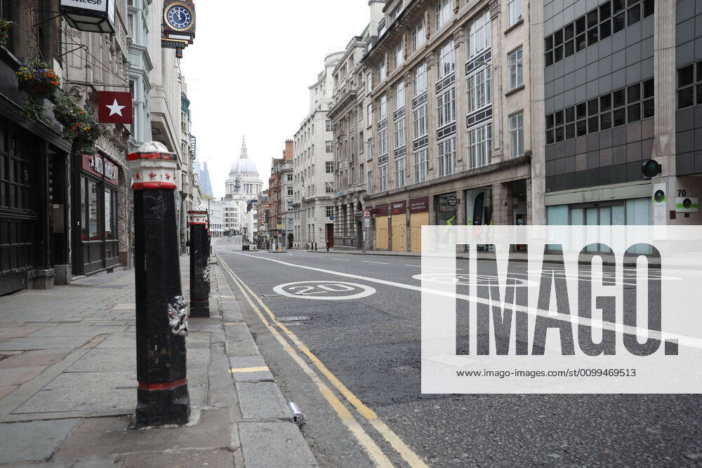 Day Twenty Six of Lockdown in London. Fleet Street is almost deserted in a very quiet central London for a Saturday as the country is on lockdown due to the COVID-19 Coronavirus pandemic. People are not allowed to leave home except for minimal food shopping, medical treatment, exercise - once a day, and essential work. COVID-19 Coronavirus lockdown, London, UK, on April 18, 2020