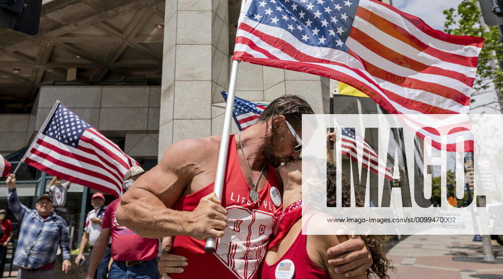 Protesters at a Liberate San Diego rally in downtown San Diego on Saturday waved signs and held banners complaining that they wanted the state to lift its stay at home order, a measure meant to reduce the spread of the coronavirus. The event was clearly political, with an overwhelming amount of signs and banners supporting President Trump. San Diego US - ZUMAp23_ 20200418_zaf_p23_021