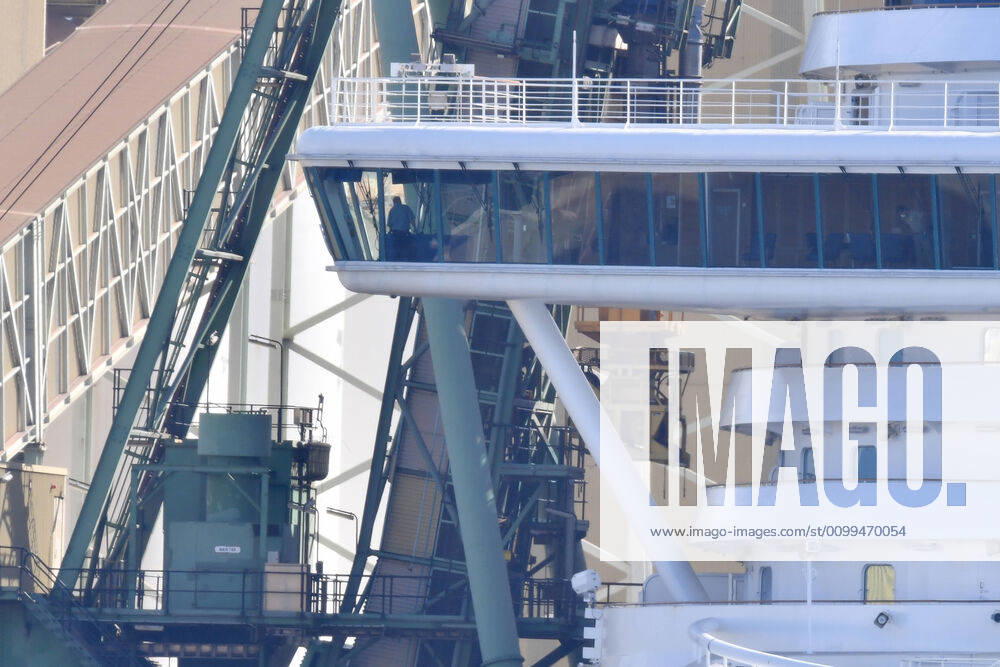 RUBY PRINCESS DEPARTURE, Crew can be seen on the Bridge of the Ruby Princess cruise which remains docked at Port Kembla, Wollongong, Sunday, April 19, 2020. A criminal investigation has been launched into how cruise line operator Carnival Australia was allowed to disembark Ruby Princess passengers in Sydney, resulting in several deaths and COVID-19 outbreaks throughout the country. The Ruby Princess was due to depart Port Kembla today. ( NO ARCHIVING, , NO USE IN BOOKS WITHOUT CONSENT WOLLONGONG NSW AUSTRALIA
