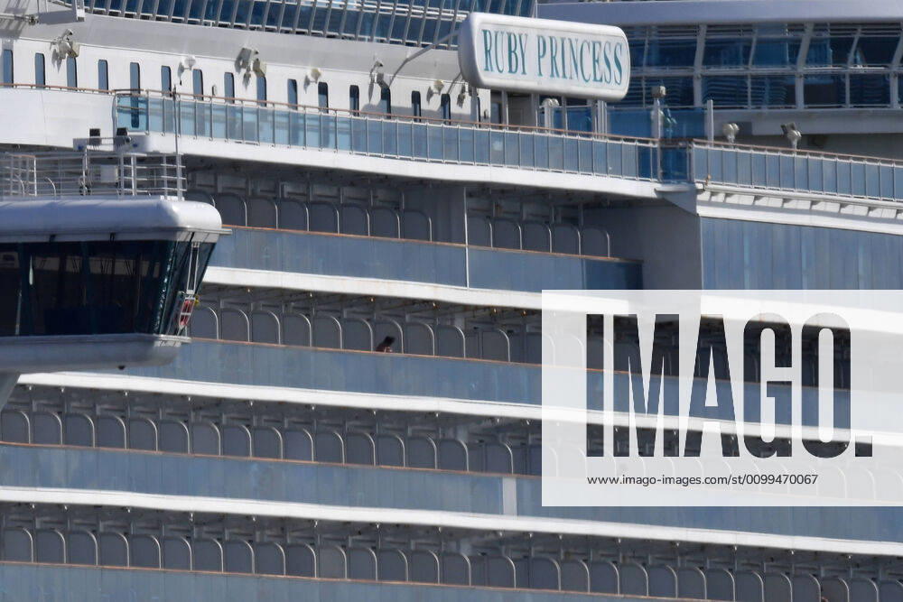 RUBY PRINCESS DEPARTURE, Crew can be seen on the Ruby Princess cruise which remains docked at Port Kembla, Wollongong, Sunday, April 19, 2020. A criminal investigation has been launched into how cruise line operator Carnival Australia was allowed to disembark Ruby Princess passengers in Sydney, resulting in several deaths and COVID-19 outbreaks throughout the country. The Ruby Princess was due to depart Port Kembla today. ( NO ARCHIVING, , NO USE IN BOOKS WITHOUT CONSENT WOLLONGONG NSW AUSTRALIA