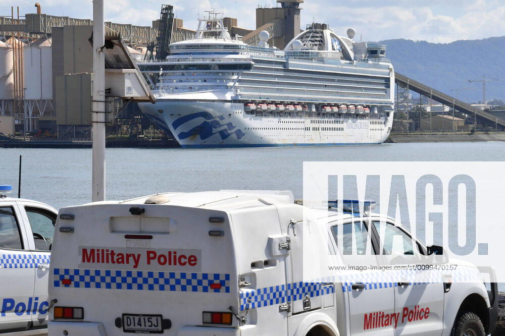RUBY PRINCESS DEPARTURE, NSW Police and Australian Defence Force Military Police are seen in front of The Ruby Princess cruiseliner which remains docked at Port Kembla, Wollongong, Sunday, April 19, 2020. A criminal investigation has been launched into how cruise line operator Carnival Australia was allowed to disembark Ruby Princess passengers in Sydney, resulting in several deaths and COVID-19 outbreaks throughout the country. The Ruby Princess was due to depart Port Kembla today. ( NO ARCHIVING, , NO USE IN BOOKS WITHOUT CONSENT WOLLONGONG NSW AUSTRALIA