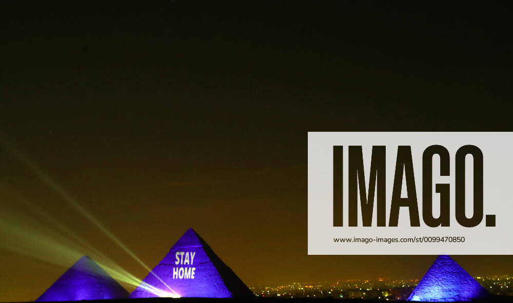 (200418) -- GIZA (EGYPT), April 18, 2020 (Xinhua) -- One of the Giza pyramids is illuminated with words STAY HOME during the World Heritage Day amid the COVID-19 pandemic in Giza, Egypt, on April 18, 2020. Egypt reported on Saturday 188 new COVID-19 cases, the highest daily increase, bringing the number of confirmed positive cases in the country to 3,032. (Xinhua Ahmed Gomaa) EGYPT-GIZA-PYRAMIDS-COVID-19-WORLD HERITAGE DAY-ILLUMINATION
