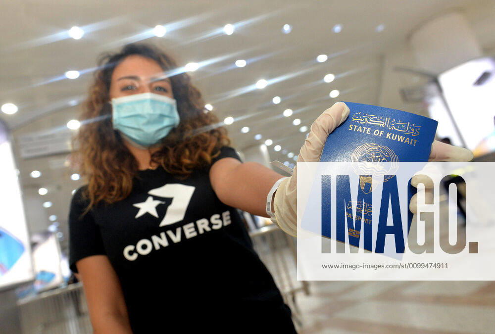 (200419) -- FARWANIYA GOVERNORATE, April 19, 2020 -- A Kuwaiti girl holds her passport after arriving at Kuwait International Airport in Farwaniya Governorate, Kuwait, April 19, 2020. Kuwait launched on Sunday its major airlift to bring home Kuwaitis stranded abroad due to the coronavirus pandemic. (Photo by Xinhua) KUWAIT-FARWANIYA GOVERNORATE-COVID-19-AIRPORT-REPATRIATION Asad