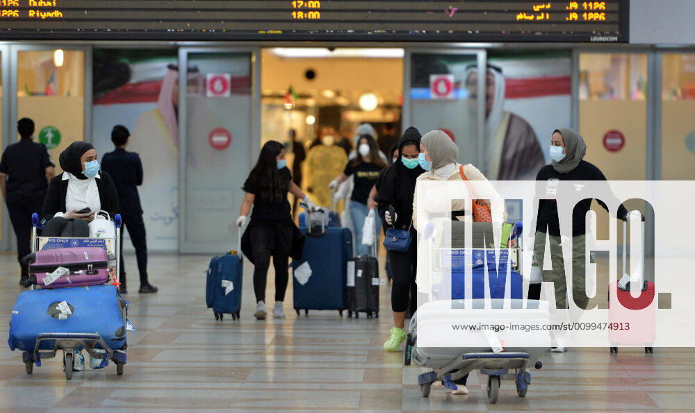 (200419) -- FARWANIYA GOVERNORATE, April 19, 2020 -- Kuwaiti passengers walk out of the arrival hall of airport after they were evacuated from abroad, at Kuwait International Airport in Farwaniya Governorate, Kuwait, April 19, 2020. Kuwait launched on Sunday its major airlift to bring home Kuwaitis stranded abroad due to the coronavirus pandemic. (Photo by Xinhua) KUWAIT-FARWANIYA GOVERNORATE-COVID-19-AIRPORT-REPATRIATION Asad