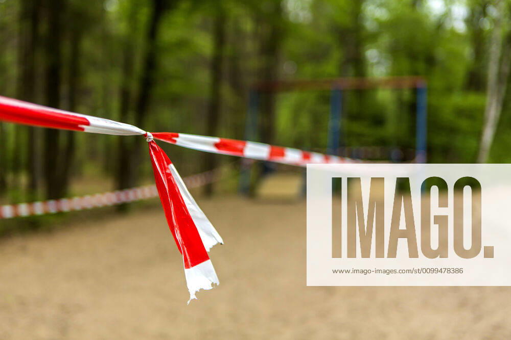 A playground in Cologne Dellbrück NRW Blocked playground due to contact ban because of the corona virus with flutterband