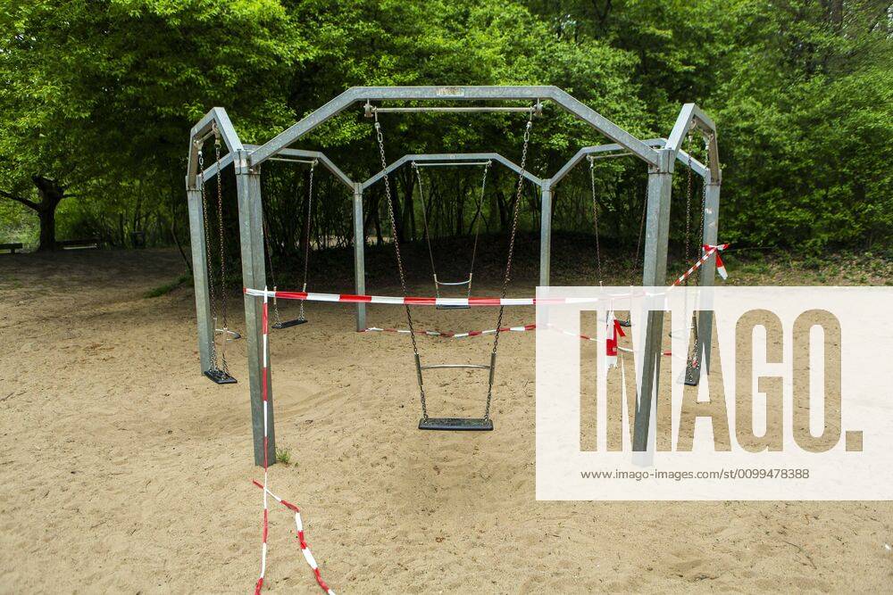 A playground in Cologne Dellbrück NRW Blocked playground due to contact ban because of the corona virus with flutterband