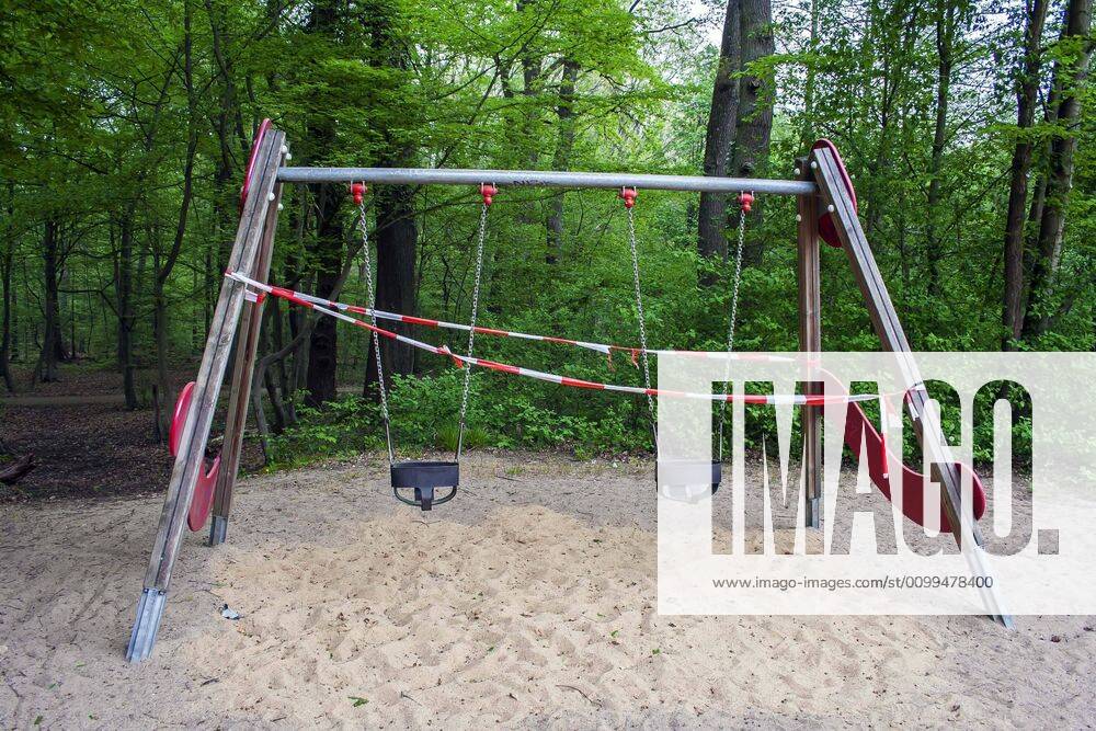 A playground in Cologne Dellbrück NRW Blocked playground due to contact ban because of the corona virus with flutterband