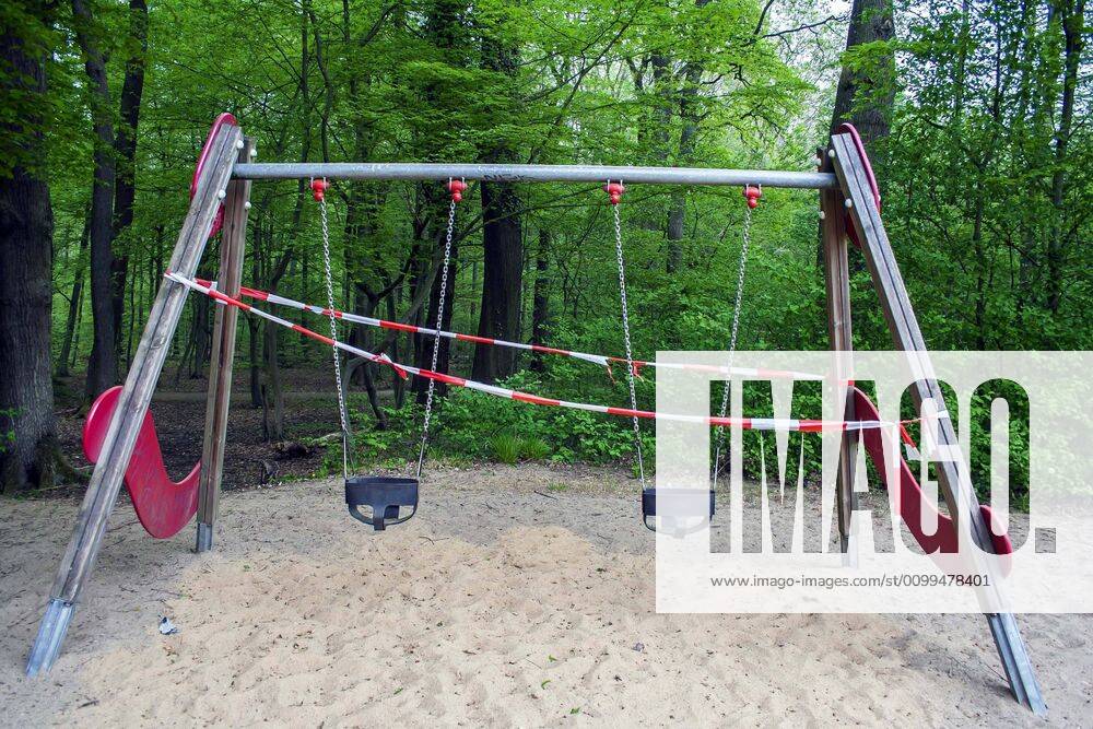 A playground in Cologne Dellbrück NRW Blocked playground due to contact ban because of the corona virus with flutterband