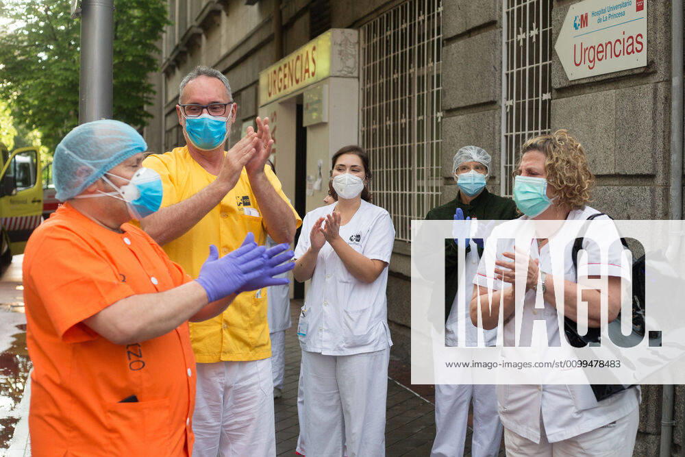 Several health workers appreciate the support during the tribute to the health workers at the Hospital de la Princesa during the Covid-19 pandemic on April 19, 2020 in Madrid, Spain Madrid SPAIN - ZUMAa181 20200419_zaa_a181_072