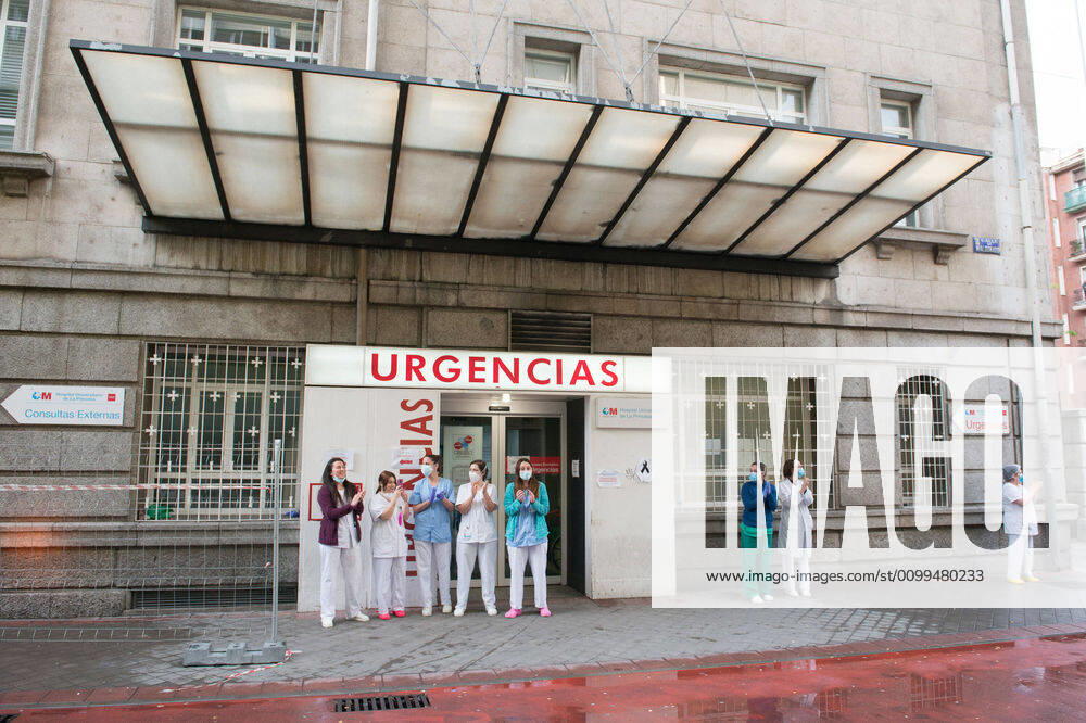 Several health workers appreciate the support during the tribute to the health workers at the Hospital de la Princesa during the Covid-19 pandemic on April 19, 2020 in Madrid, Spain Madrid SPAIN - ZUMAa181 20200419_zaa_a181_093