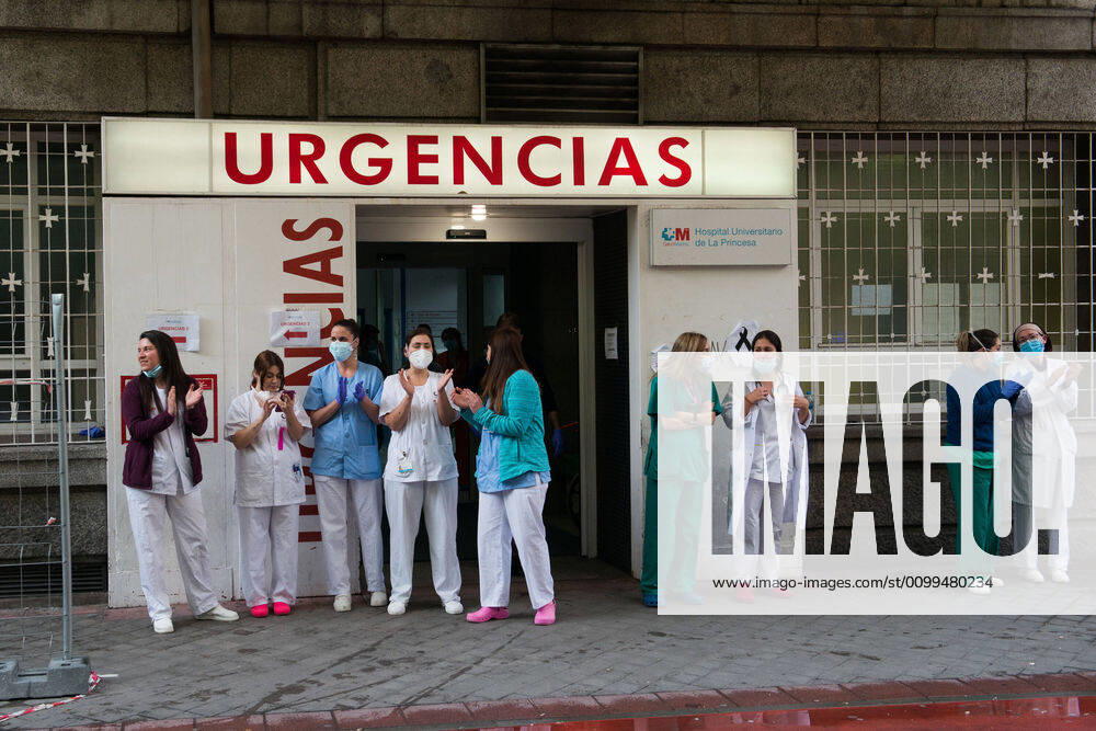 Several health workers appreciate the support during the tribute to the health workers at the Hospital de la Princesa during the Covid-19 pandemic on April 19, 2020 in Madrid, Spain Madrid SPAIN - ZUMAa181 20200419_zaa_a181_094