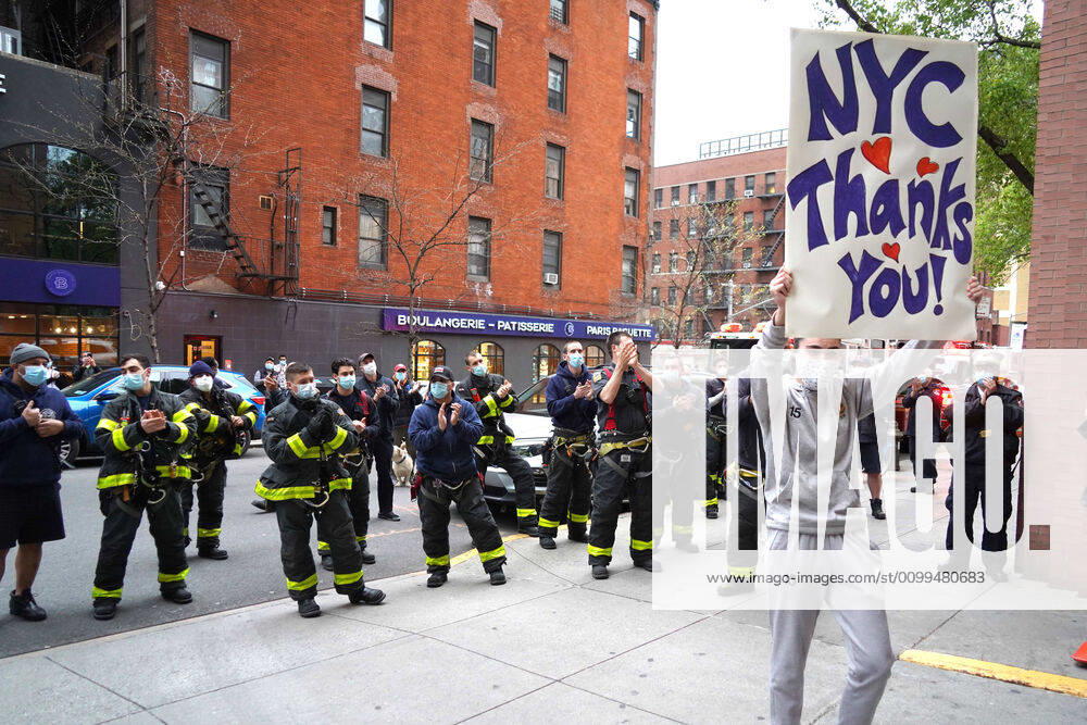 NYC during Covid,.Cheering at 7 PM at Mount Sinai West,.Midtown West, NYC.April 19, 2020.Photos by Sonia Moskowitz. New York USA - ZUMAm334 20200419_zep_m334_005