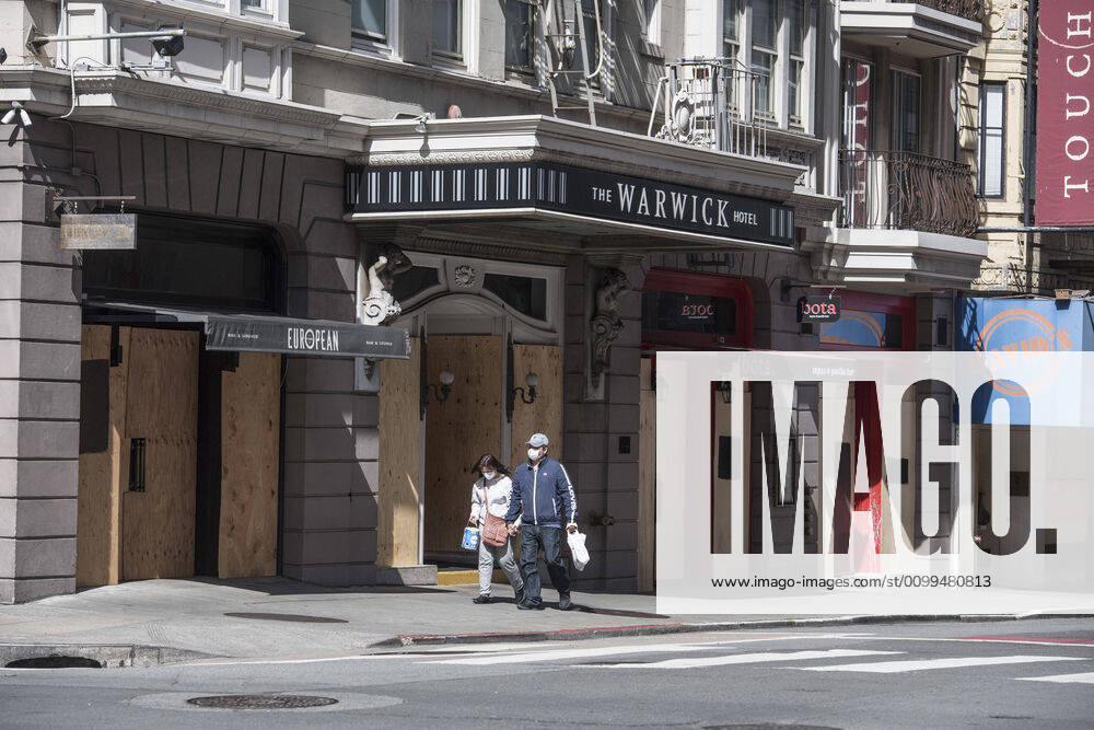 Business are boarded up along Geary Blvd in San Francisco on Sunday, April 19, 2020. San Francisco Mayor London Breed says that efective now, face masks must be worn outside the home to protect against coronavirus. SXP2020041907 TERRYxSCHMITT