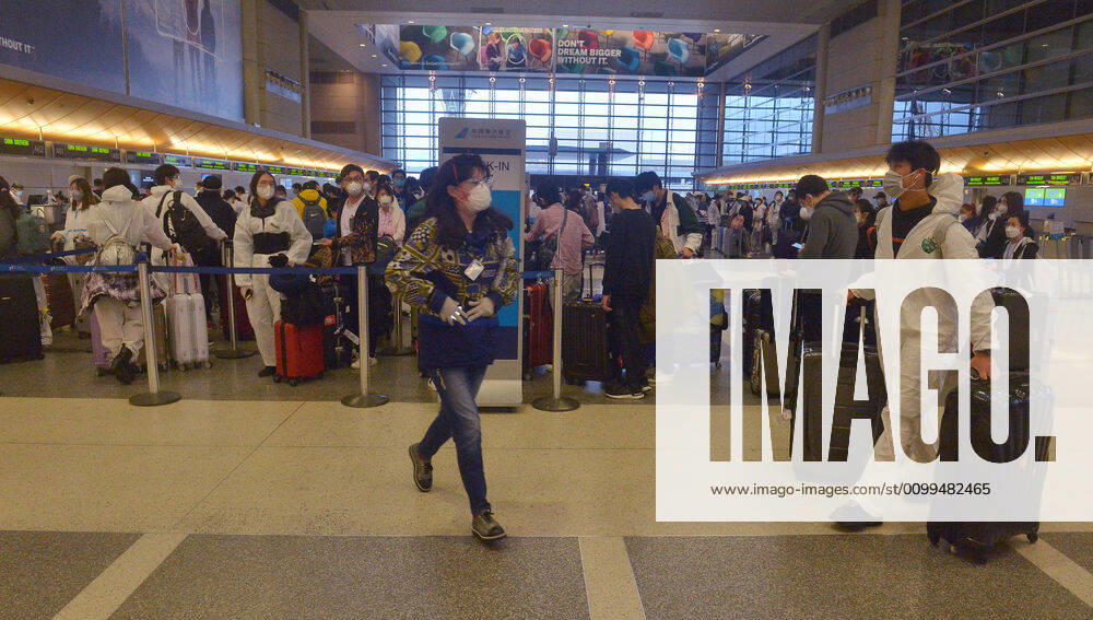 Hundreds of passengers form a line to check-in and board a China Southern Airlines midnight flight to China on Sunday, April 19, 2020 in Los Angeles. Passengers at the front of the line arrived at 5:30 a.m., with many others standing in line since 8 a.m. to ensure they would have a seat before the plane was full. Mayor Eric Garcetti said 95% of air travel has stopped in his city as Los Angeles sees the biggest drop of airplane travel in LAX history. LAP2020041903 JIMxRUYMEN
