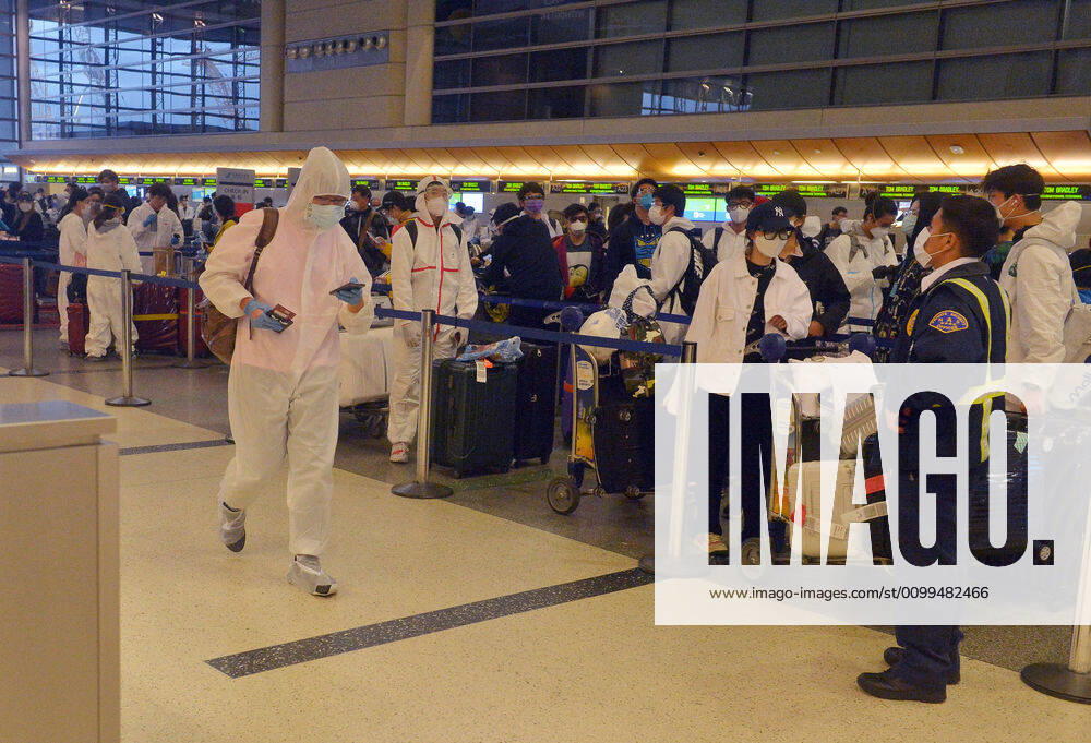 Hundreds of passengers form a line to check-in and board a China Southern Airlines midnight flight to China on Sunday, April 19, 2020 in Los Angeles. Passengers at the front of the line arrived at 5:30 a.m., with many others standing in line since 8 a.m. to ensure they would have a seat before the plane was full. Mayor Eric Garcetti said 95% of air travel has stopped in his city as Los Angeles sees the biggest drop of airplane travel in LAX history. LAP2020041904 JIMxRUYMEN
