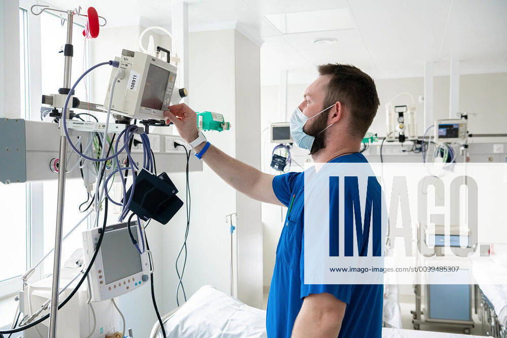 A healthcare worker in an intensive care room at an in-patient medical center for COVID-19 patients opened at city hospital No 24. The center resides in a repurposed building of the hospital; it is divided into clean and dirty areas, patient rooms are equipped with an oxygen supply system; showers and sanitary inspection posts have been installed in order to contain the spread of the novel coronavirus infection. Maxim Mishin Moscow Mayor and Moscow Government Press Office TASS TS0D6684