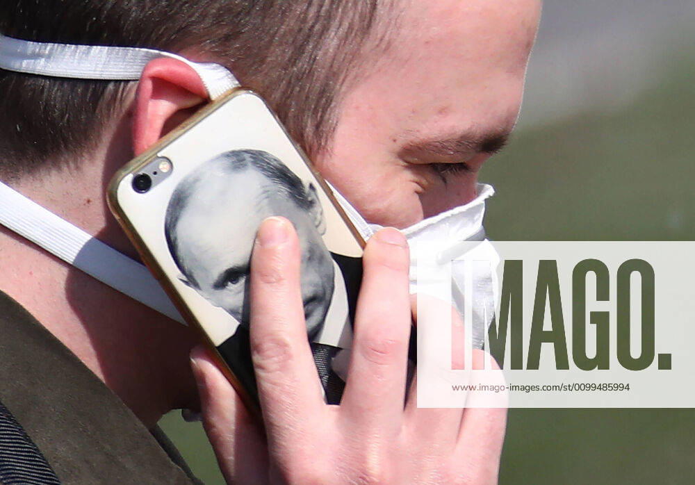 A man talks on the phone at the Novomoskovsky multipurpose medical center for patients with suspected COVID-19 coronavirus infection. Valery Sharifulin TASS TS0D66CD
