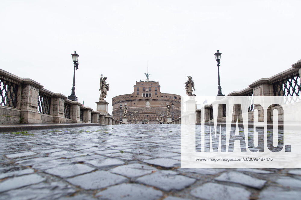 Italy: Rome in the rain during Covid-19 lockdown Views of Sant Angelo bridge with Castel Sant Angelo in the rain during the lockdown for the Covid-19 pandemic, today 20 April 2020 Roma Italy