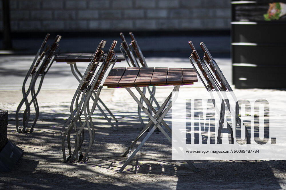 Chairs and tables stand together in front of a snack bar in Berlin, 20 04 2020 Due to the spread of the coronavirus, restaurants and snack bars are not allowed to open their doors without restrictions Berlin Germany