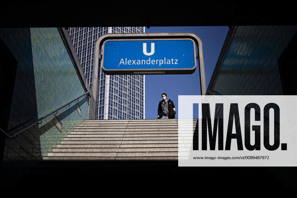 A man with a face mask enters the underground station at Alexanderplatz in Berlin, 20 04 2020 There is a nationwide discussion about a possible obligation to wear a mask due to the Corona Pandemic Saxony meanwhile introduced an obligation to wear a mask in public transport and when shopping Berlin Germany