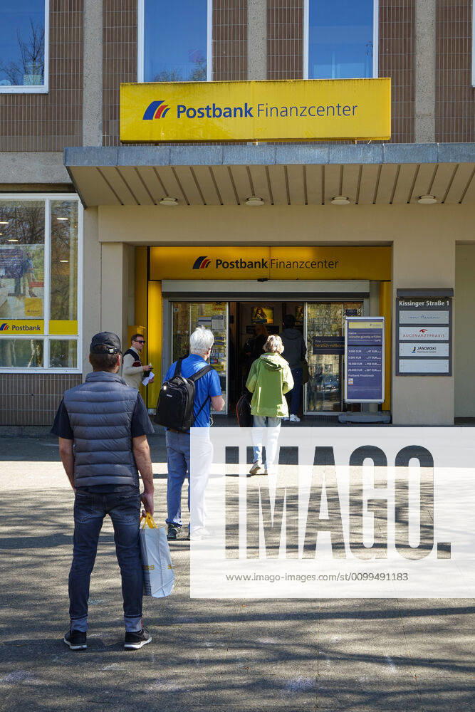 Berlin,Germany,GER,the city in times of the Corona Pandemic Numerous people are queuing up Post Postbank Branch 33 in Kissinger Strasse in the district of Wilmersdorf, district of Schmargendorf