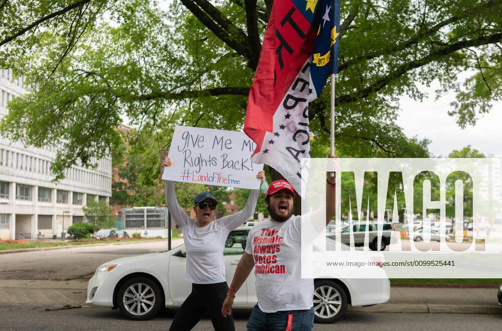 ReOpenNC protesters calling for ending or relaxing coronavirus executive orders in Raleigh, NC Tuesday, April 21, 2020. Raleigh USA - ZUMAd43_ 20200421_znp_d43_017