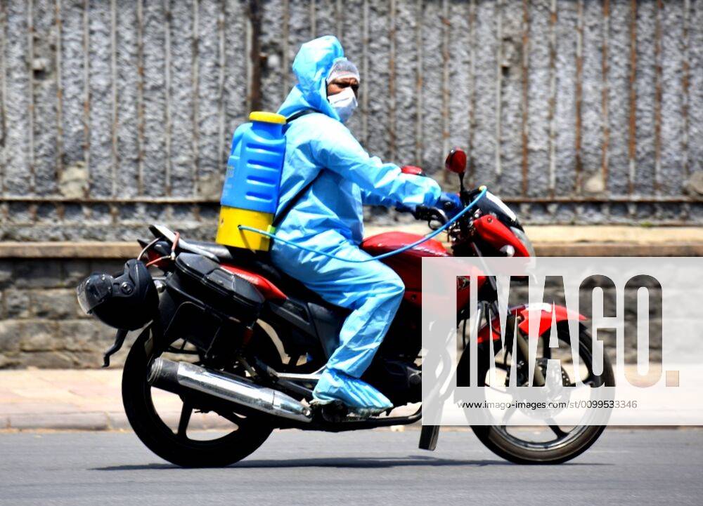 A man wearing PPE seen on a motorbike at JLN marg during lockdown on April 21, 2020 in New Delhi, India. (Photo by Sonu Mehta Hindustan Times) Sanitization Drive To Curb The Spread Of Coronavirus COVID-19