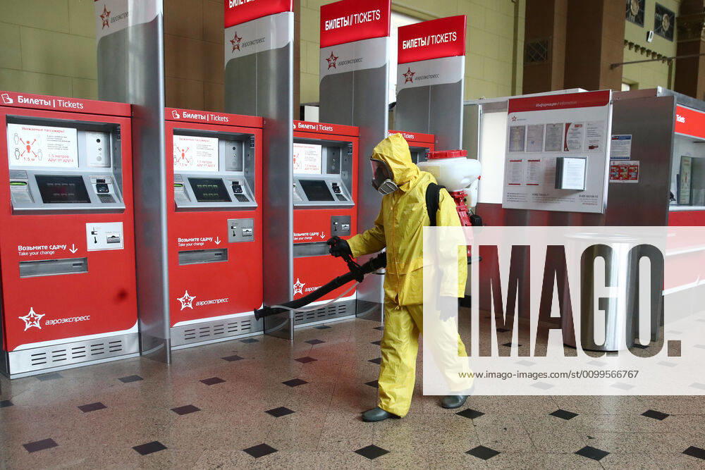 An Emercom worker in a protective suit carries out disinfection procedures at Kiyevsky railway station amid the ongoing COVID-19 pandemic. Sergei Fadeichev TASS TS0D6A3B