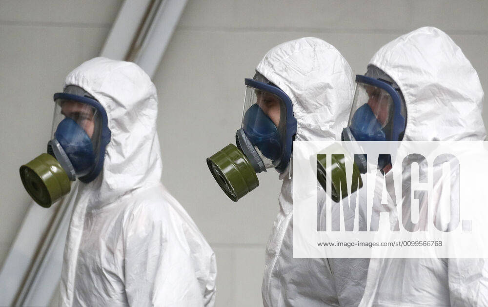 Emercom workers in protective suits and gas masks carry out disinfection procedures at Kiyevsky railway station amid the ongoing COVID-19 pandemic. Sergei Fadeichev TASS TS0D6A3C