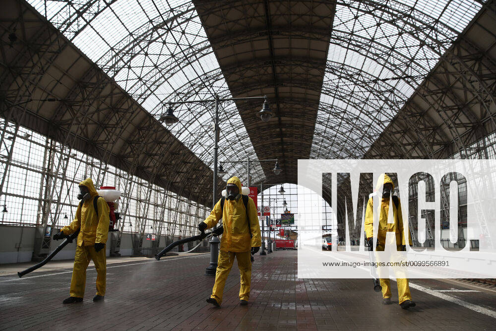 Emercom workers in protective suits carry out disinfection procedures at Kiyevsky railway station amid the ongoing COVID-19 pandemic. Sergei Fadeichev TASS TS0D6A3E
