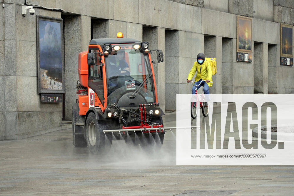 A street sweeper washes pavements on Tverskaya Street with disinfectant amid the ongoing COVID-19 pandemic; the Russian government has extended a paid period off work until April 30 nationwide to counter the spread of the COVID-19 infection. Mikhail Metzel TASS TS0D6A4E