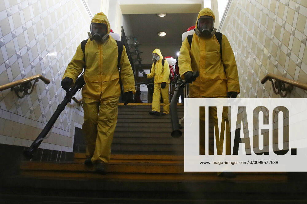 Emercom workers in protective suits carry out disinfection procedures at Kiyevsky railway station amid the ongoing COVID-19 pandemic. Sergei Fadeichev TASS TS0D6A54
