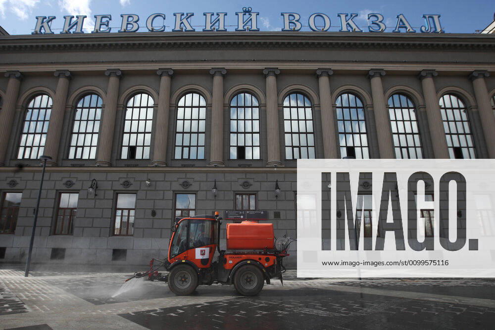 A street sweeper washes pavements outside Kiyevsky railway station amid the ongoing COVID-19 pandemic. Sergei Fadeichev TASS TS0D6A86