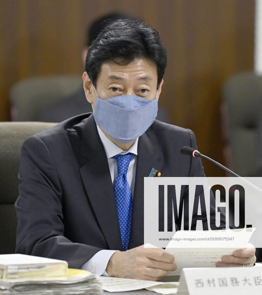 New coronavirus Japanese economic revitalization minister Yasutoshi Nishimura speaks at a meeting of a government panel working on measures against the new coronavirus in Tokyo on April 22, 2020.