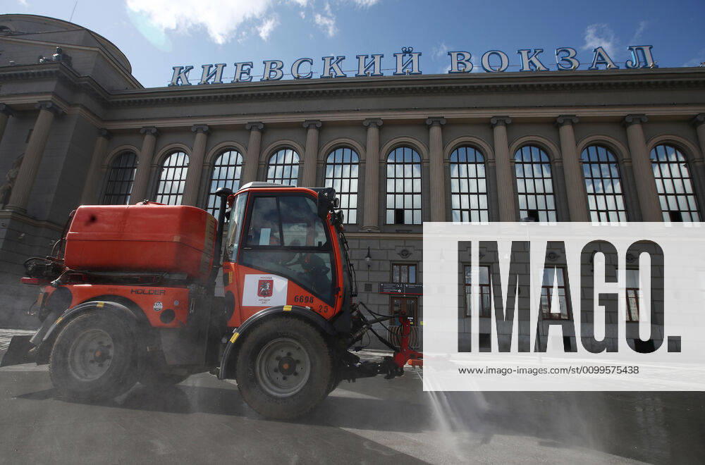 A street sweeper washes pavements with disinfectant outside Kiyevsky railway station amid the ongoing COVID-19 pandemic. Sergei Fadeichev TASS TS0D6A96