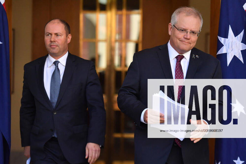 SCOTT MORRISON CORONAVIRUS UPDATE, Treasurer Josh Frydenberg and Prime Minister Scott Morrison arrive at a press conference in Canberra, Thursday, April 23, 2020. ( NO ARCHIVING, , NO USE IN BOOKS WITHOUT CONSENT Canberra ACT AUSTRALIA