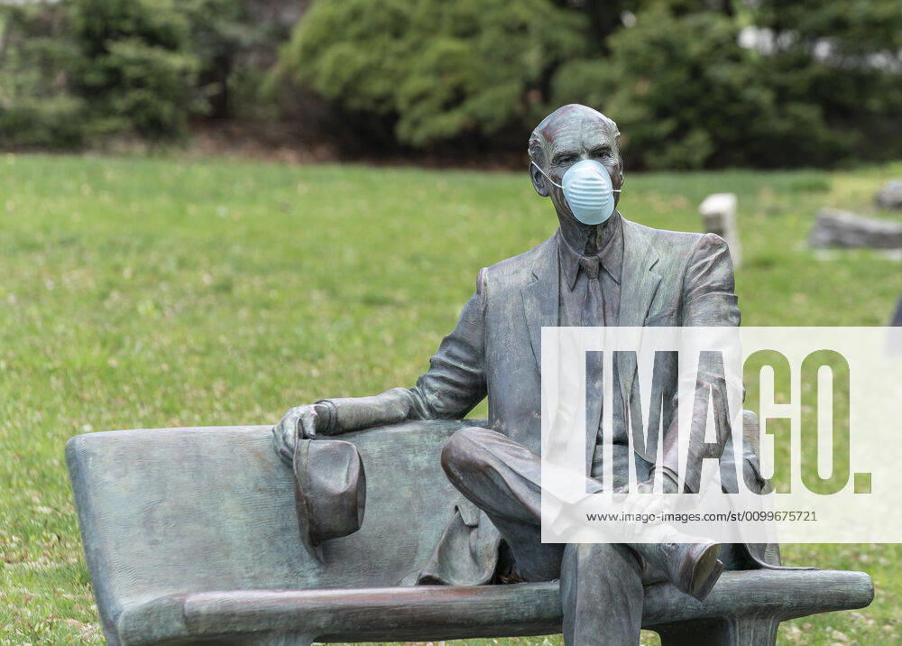 NY: Operation Gridlock in Albany Sculpture of Lewis Swyer with facial mask seen outside of New York State Capitol Building during COVID-19 pandemic Albany New York United States