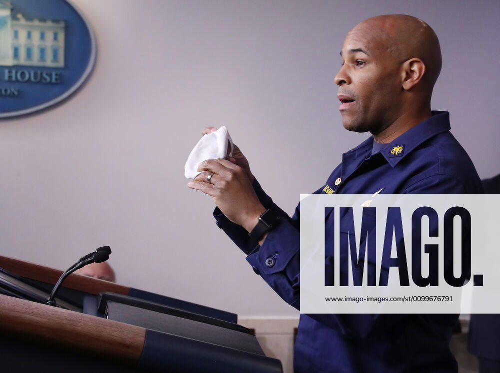 US Surgeon General Jerome Adams shows his mask as he and members of the Coronavirus Task Force to deliver remarks on the COVID-19 pandemic in the James S. Brady Press Briefing Room of the White House in Washington, DC, USA, 22 April 2020 Washington USA - ZUMAs152 20200422_zaa_s152_089