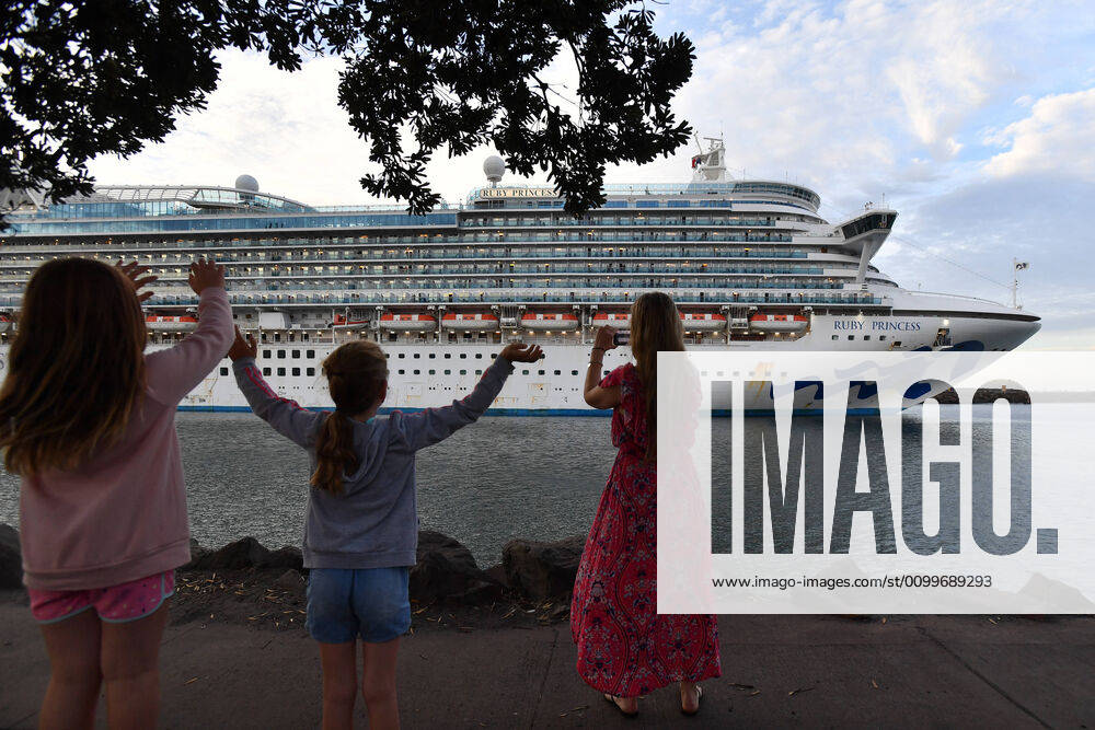 RUBY PRINCESS DEPARTURE, Residents wave farewell to crew onboard the Ruby Princess cruise ship as it departs Port Kembla in Wollongong, New South Wales, Thursday, April 23, 2020. The Ruby Princess cruise ship has been told to leave Australia by Thursday. ( NO ARCHIVING, , NO USE IN BOOKS WITHOUT CONSENT SYDNEY NSW AUSTRALIA