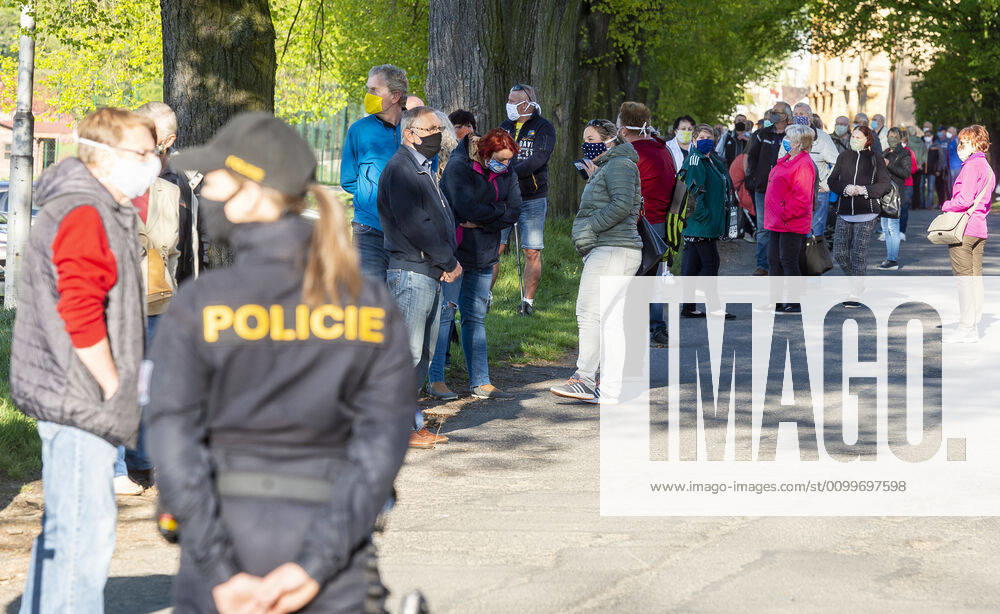 People waiting queue to take a sample for a covid-19 test, on April 23, 2020, in Litomerice, Czech Republic. Across-the-board testing of population for new coronavirus began today. Test points open in Prague at 10:00, in Brno and Litomerice at 8:00. The goal is to find out the presence of coronavirus in Czech population. (CTKxPhoto OndrejxHajek) CTKPhotoP202004230299301 HAJ 07