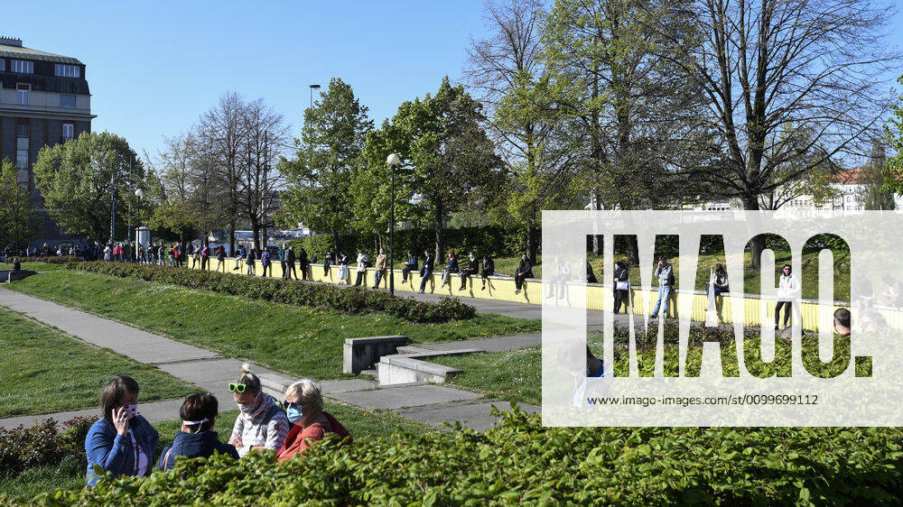 People waiting queue to take a sample for a covid-19 test, on April 23, 2020, in Zitek Gardens, Prague, Czech Republic. Across-the-board testing of population for new coronavirus began today. Test points open in Prague at 10:00, in Brno and Litomerice at 8:00. The goal is to find out the presence of coronavirus in Czech population. (CTKxPhoto MichalxKamaryt) CTKPhotoP202004230318901 kmt 1
