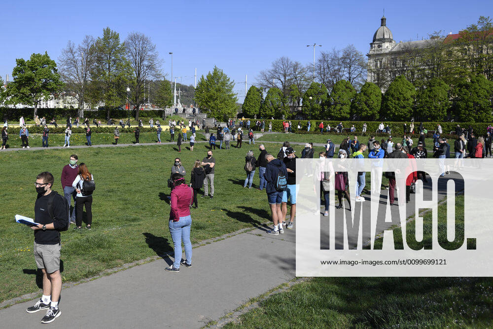 People waiting queue to take a sample for a covid-19 test, on April 23, 2020, in Zitek Gardens, Prague, Czech Republic. Across-the-board testing of population for new coronavirus began today. Test points open in Prague at 10:00, in Brno and Litomerice at 8:00. The goal is to find out the presence of coronavirus in Czech population. (CTKxPhoto MichalxKamaryt) CTKPhotoP202004230319801 kmt 4