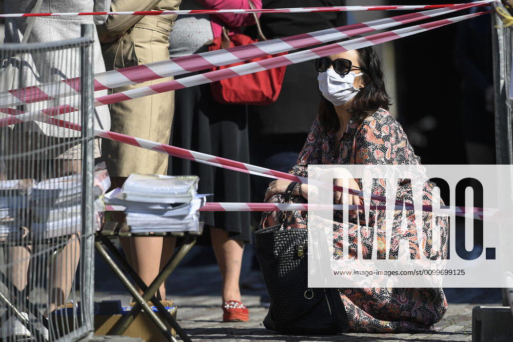 People waiting queue to take a sample for a covid-19 test, on April 23, 2020, in Zitek Gardens, Prague, Czech Republic. Across-the-board testing of population for new coronavirus began today. Test points open in Prague at 10:00, in Brno and Litomerice at 8:00. The goal is to find out the presence of coronavirus in Czech population. (CTKxPhoto MichalxKamaryt) CTKPhotoP202004230320101 kmt 5